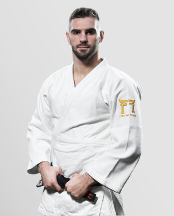 Judogi with gold logo on the shoulders