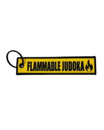 Porte-clés tag flammable judoka écrit en noir sur fond jaune